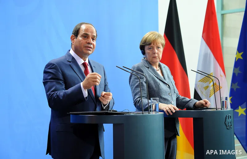 German Chancellor Angela Merkel and Egyptian President Abdel Fattah al-Sisi shake hands attend a press conference on June 3, 2015 at the Chancellery in Berlin. Photo by Egyptian Presidency