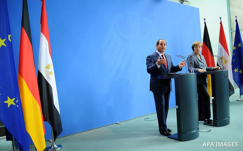 German Chancellor Angela Merkel and Egyptian President Abdel Fattah al-Sisi shake hands attend a press conference on June 3, 2015 at the Chancellery in Berlin. Photo by Egyptian Presidency