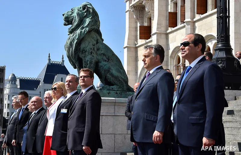 Egyptian President Abdel Fattah al-Sisi and Hungarian Prime Minister Viktor Orban inspect the honour guard in front of the parliament building in Budapest on June 5, 2015 during his welcoming ceremony. The Egyptian guest...