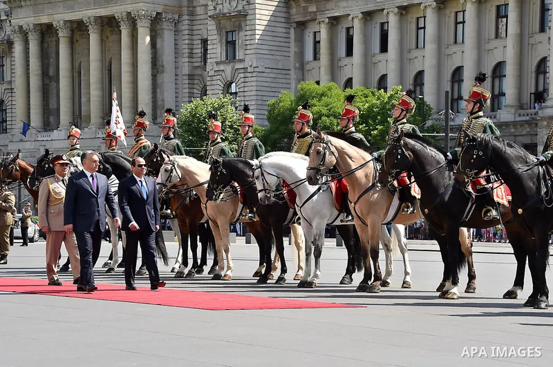 Egyptian President Abdel Fattah al-Sisi and Hungarian Prime Minister Viktor Orban inspect the honour guard in front of the parliament building in Budapest on June 5, 2015 during his welcoming ceremony. The Egyptian guest...