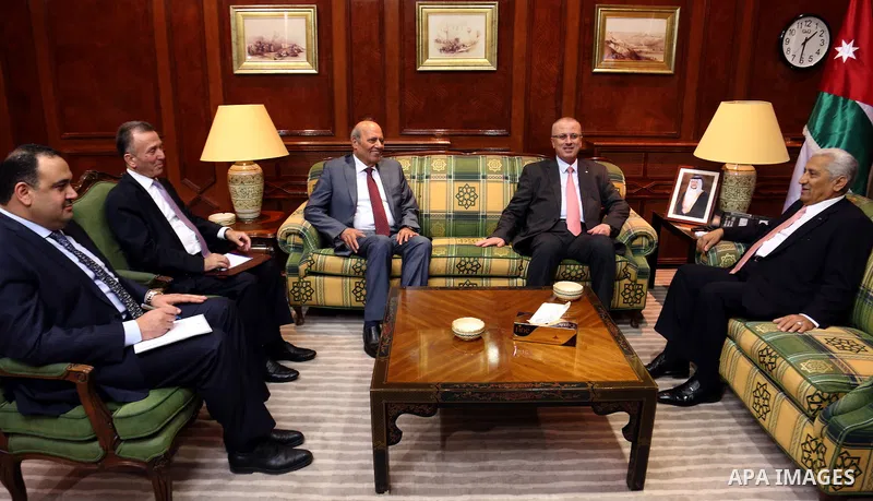 Palestinian Prime Minister Rami Hamdallah meets with Jordanian Prime Minister Abdullah Ensour in Amman on June 06, 2015. Photo by Prime Minister Office