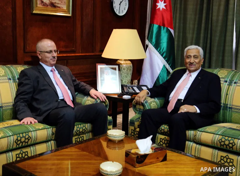 Palestinian Prime Minister Rami Hamdallah meets with Jordanian Prime Minister Abdullah Ensour in Amman on June 06, 2015. Photo by Prime Minister Office