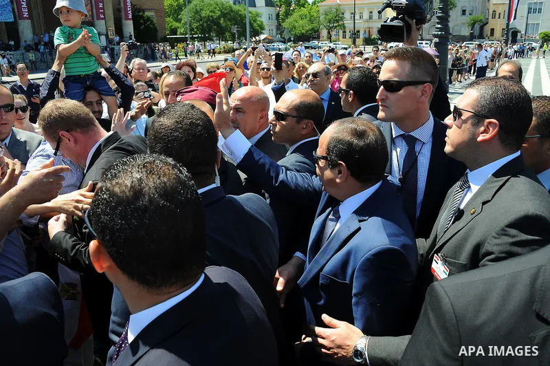 Egyptian President Abdel Fattah al-Sisi greets the Hungarian Egyptian community in Budapest on June 6, 2015. Photo by Egyptian Presidency