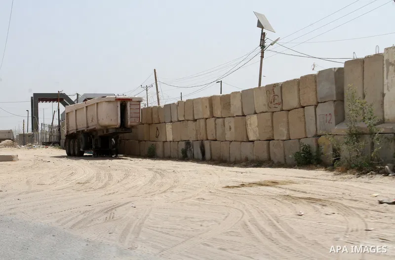 The gate of the Kerem Shalom crossing is seen closed between Israel and the southern Gaza Strip, south of Rafah, on June 7, 2015 after Israel closed, until further notice, the Erez crossing for people and the Kerem Shalo...