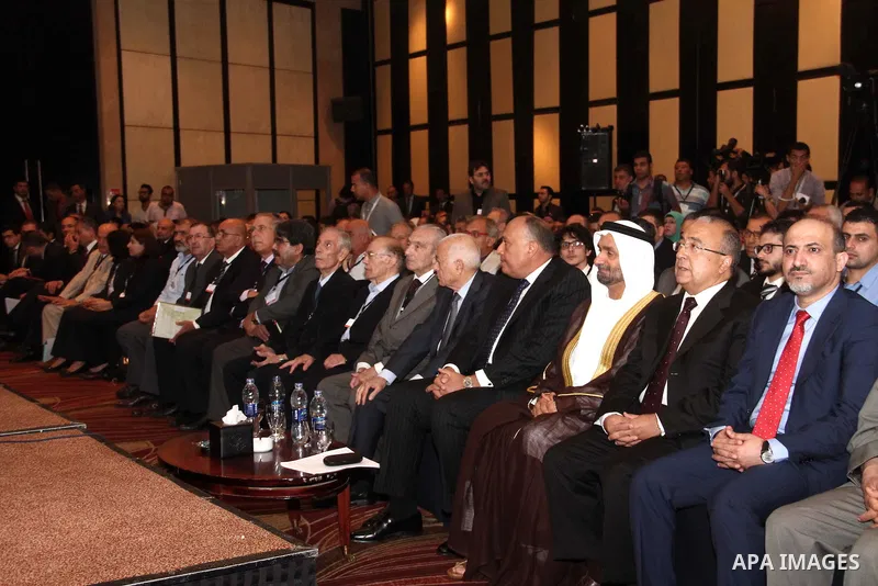 Egyptian Foreign Minister Sameh Shoukry, Secretary General of the Arab League Nabil al-Arabi and the Head of the Arab Parliament, Ahmad al-Jarwan take part in a two-day meeting with Syrian opposition representatives aimi...