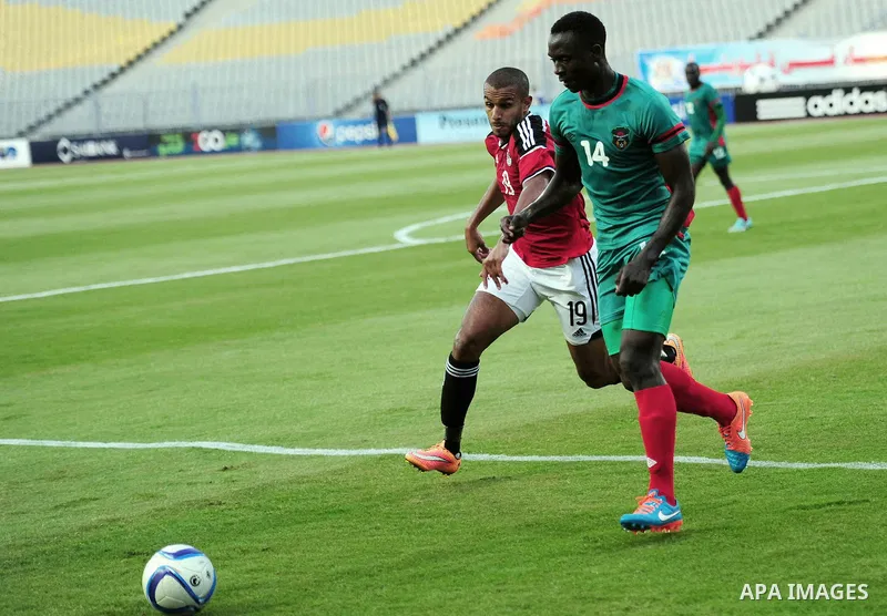 Players of Egyptian national team play against Malawi national team during a friendly match in Alexandria on June 8, 2015. Photo by Stringer