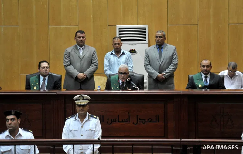 Judges attend the trial of Egyptian defendants over a 2012 stadium riot in the canal city of Port Said that left 74 people dead, on June 9, 2015 in a court in the Egyptian capital, Cairo. The court upheld death sentences...