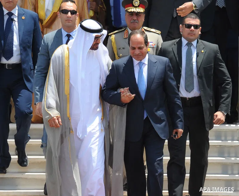 Egyptian President Abdel Fattah al-Sisi bids farewell to UAE's Foreign Minister Sheikh Abdullah bin Zayed bin Sultan Al Nahyan following his official visit on June 9, 2015 in the Egyptian capital, Cairo. Photo by Egyptia...