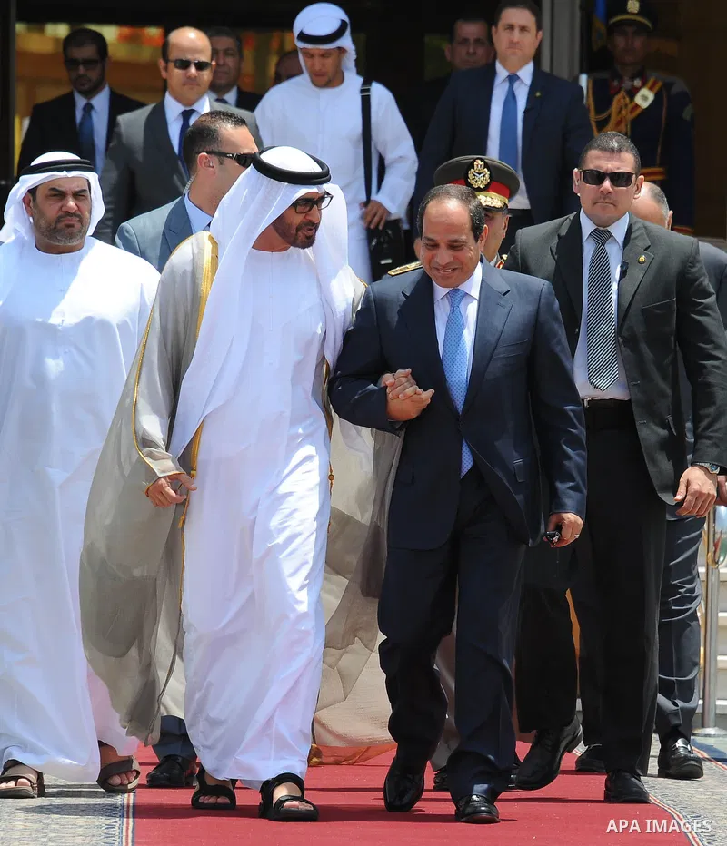 Egyptian President Abdel Fattah al-Sisi bids farewell to UAE's Foreign Minister Sheikh Abdullah bin Zayed bin Sultan Al Nahyan following his official visit on June 9, 2015 in the Egyptian capital, Cairo. Photo by Egyptia...