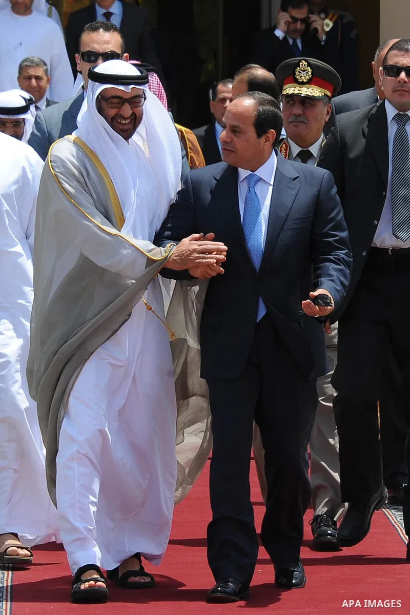 Egyptian President Abdel Fattah al-Sisi bids farewell to UAE's Foreign Minister Sheikh Abdullah bin Zayed bin Sultan Al Nahyan following his official visit on June 9, 2015 in the Egyptian capital, Cairo. Photo by Egyptia...