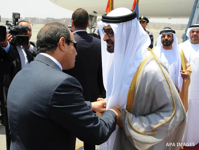 Egyptian President Abdel Fattah al-Sisi bids farewell to UAE's Foreign Minister Sheikh Abdullah bin Zayed bin Sultan Al Nahyan following his official visit on June 9, 2015 in the Egyptian capital, Cairo. Photo by Egyptia...