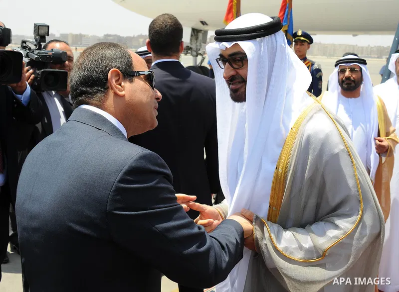 Egyptian President Abdel Fattah al-Sisi bids farewell to UAE's Foreign Minister Sheikh Abdullah bin Zayed bin Sultan Al Nahyan following his official visit on June 9, 2015 in the Egyptian capital, Cairo. Photo by Egyptia...