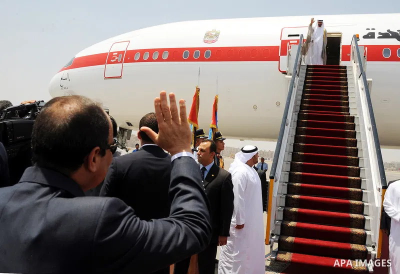 Egyptian President Abdel Fattah al-Sisi bids farewell to UAE's Foreign Minister Sheikh Abdullah bin Zayed bin Sultan Al Nahyan following his official visit on June 9, 2015 in the Egyptian capital, Cairo. Photo by Egyptia...