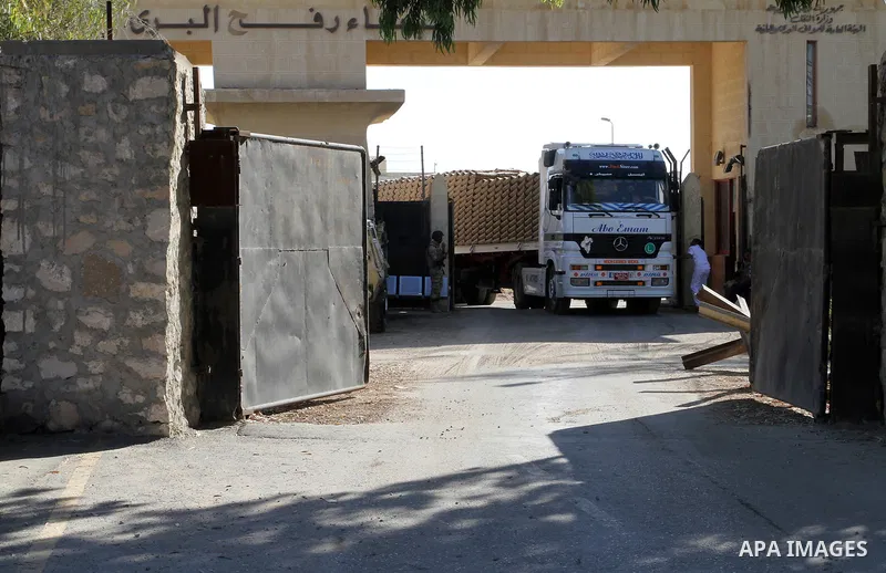 A truck loaded with cement enters the Gaza Strip from Egypt through the Rafah border crossing in southern Gaza Strip, on June 13, 2015. Egyptian authorities for the first time since the expulsion of Mohammed Morsi of the...