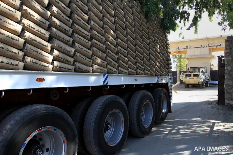 A truck loaded with cement enters the Gaza Strip from Egypt through the Rafah border crossing in southern Gaza Strip, on June 13, 2015. Egyptian authorities for the first time since the expulsion of Mohammed Morsi of the...
