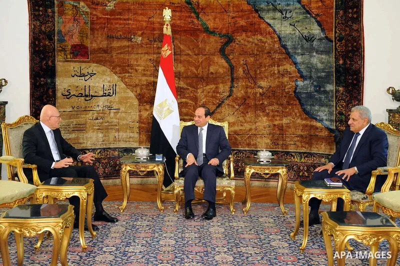 A handout picture made available by the Egyptian Presidency on June 17, 2015 shows Egypt's President Abdel Fattah al-Sisi and his Prime Minister Ibrahim Mahlab meets with Lebanese Prime Minister Tammam Salam at the presi...