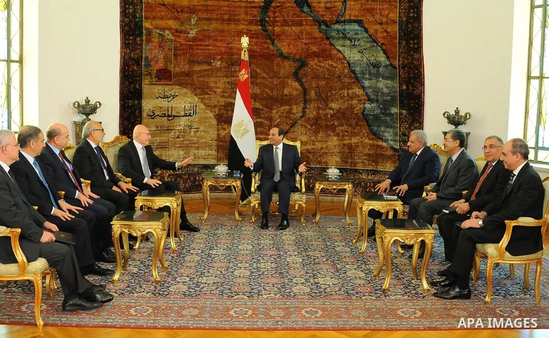 A handout picture made available by the Egyptian Presidency on June 17, 2015 shows Egypt's President Abdel Fattah al-Sisi and his Prime Minister Ibrahim Mahlab meets with Lebanese Prime Minister Tammam Salam at the presi...