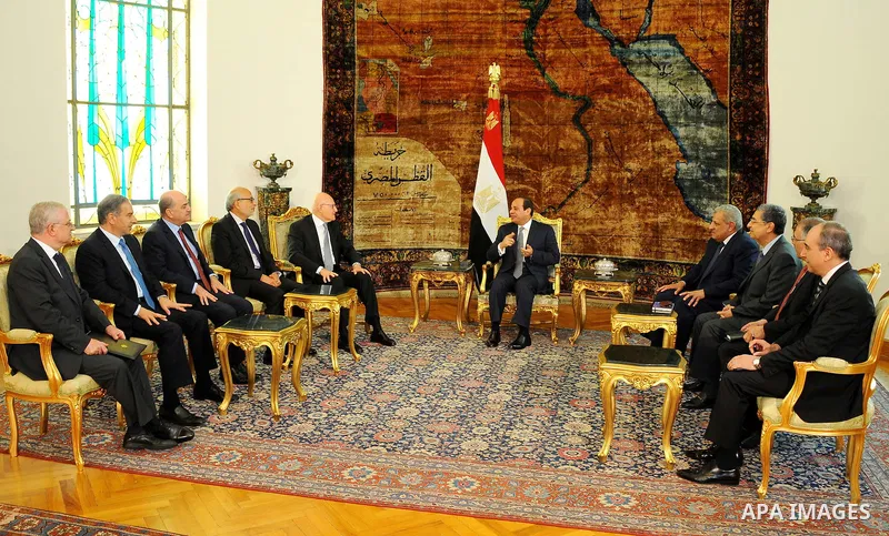 A handout picture made available by the Egyptian Presidency on June 17, 2015 shows Egypt's President Abdel Fattah al-Sisi and his Prime Minister Ibrahim Mahlab meets with Lebanese Prime Minister Tammam Salam at the presi...