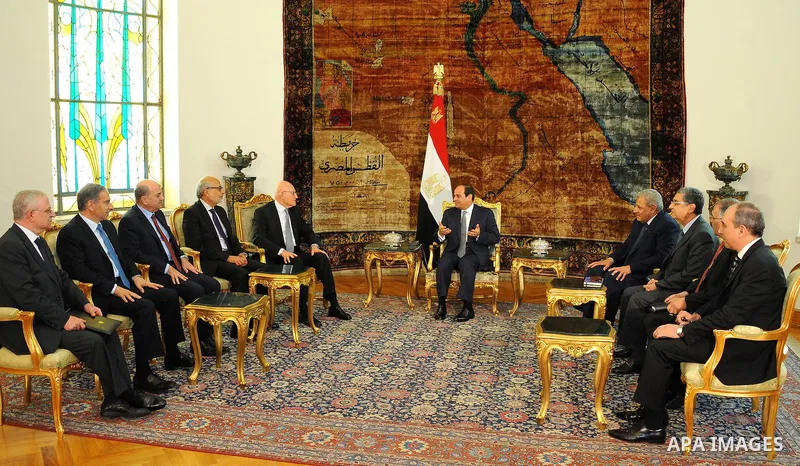 A handout picture made available by the Egyptian Presidency on June 17, 2015 shows Egypt's President Abdel Fattah al-Sisi and his Prime Minister Ibrahim Mahlab meets with Lebanese Prime Minister Tammam Salam at the presi...