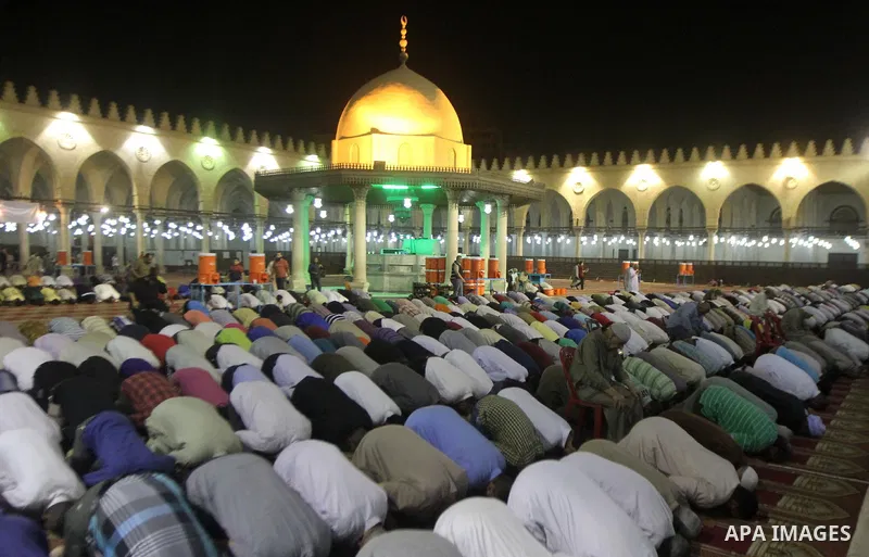 Egyptian worshipers perform take part in an evening prayer "Taraweeh", at Amr Ibn al-Aas mosque, in Cairo on June 17, 2015. Millions of Muslims around the world will mark the start of Ramadan on Thursday June 18, a month...
