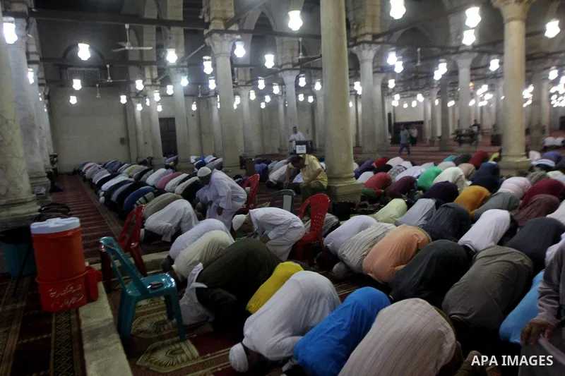 Egyptian worshipers perform take part in an evening prayer "Taraweeh", at Amr Ibn al-Aas mosque, in Cairo on June 17, 2015. Millions of Muslims around the world will mark the start of Ramadan on Thursday June 18, a month...