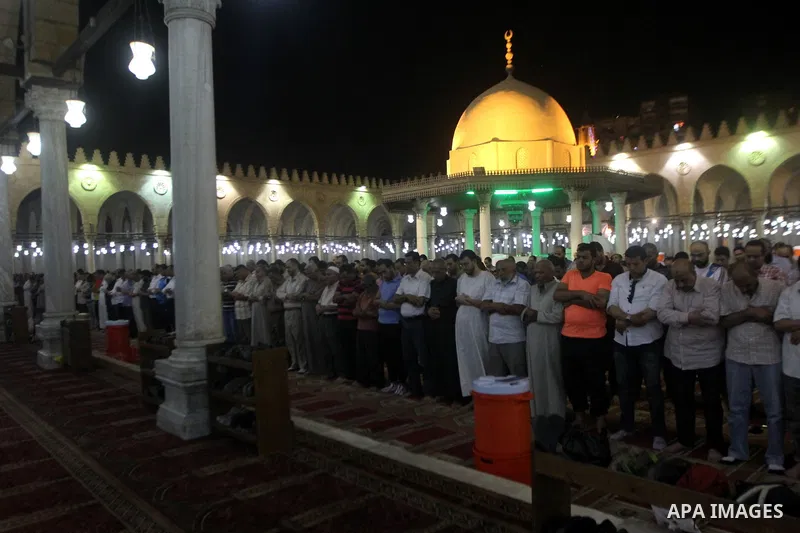 Egyptian worshipers perform take part in an evening prayer "Taraweeh", at Amr Ibn al-Aas mosque, in Cairo on June 17, 2015. Millions of Muslims around the world will mark the start of Ramadan on Thursday June 18, a month...