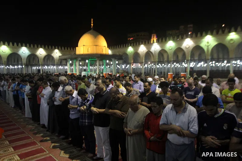 Egyptian worshipers perform take part in an evening prayer "Taraweeh", at Amr Ibn al-Aas mosque, in Cairo on June 17, 2015. Millions of Muslims around the world will mark the start of Ramadan on Thursday June 18, a month...