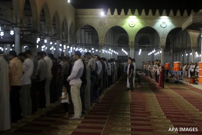 Egyptian worshipers perform take part in an evening prayer "Taraweeh", at Amr Ibn al-Aas mosque, in Cairo on June 17, 2015. Millions of Muslims around the world will mark the start of Ramadan on Thursday June 18, a month...