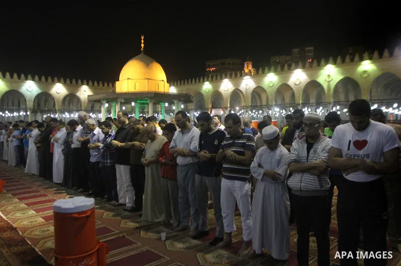Egyptian worshipers perform take part in an evening prayer "Taraweeh", at Amr Ibn al-Aas mosque, in Cairo on June 17, 2015. Millions of Muslims around the world will mark the start of Ramadan on Thursday June 18, a month...