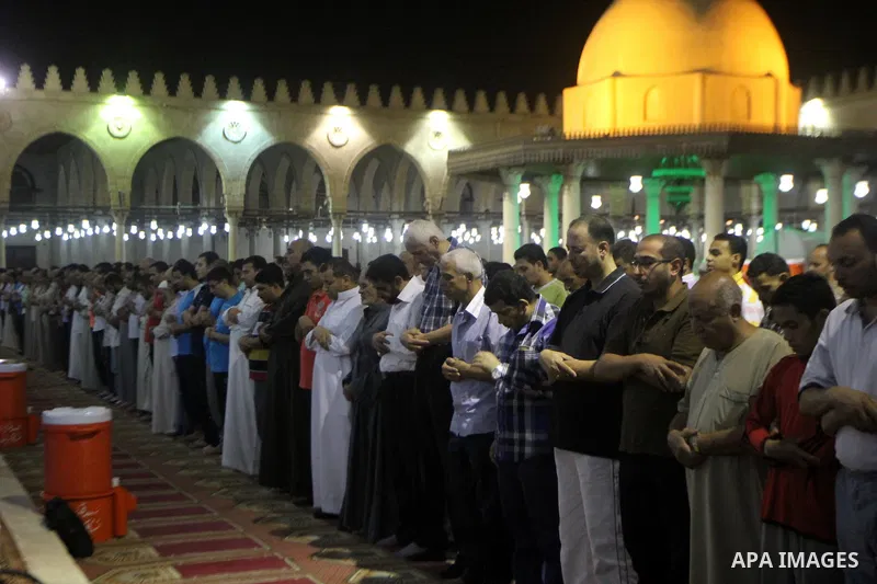 Egyptian worshipers perform take part in an evening prayer "Taraweeh", at Amr Ibn al-Aas mosque, in Cairo on June 17, 2015. Millions of Muslims around the world will mark the start of Ramadan on Thursday June 18, a month...