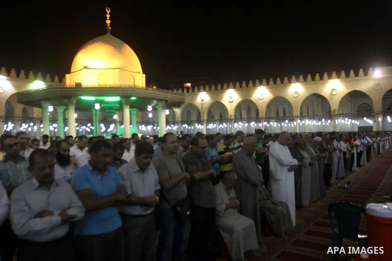 Egyptian worshipers perform take part in an evening prayer "Taraweeh", at Amr Ibn al-Aas mosque, in Cairo on June 17, 2015. Millions of Muslims around the world will mark the start of Ramadan on Thursday June 18, a month...