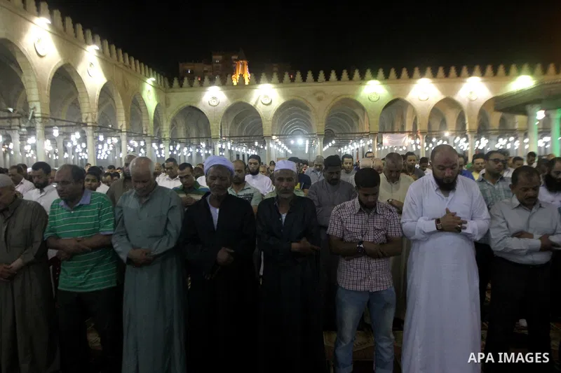Egyptian worshipers perform take part in an evening prayer "Taraweeh", at Amr Ibn al-Aas mosque, in Cairo on June 17, 2015. Millions of Muslims around the world will mark the start of Ramadan on Thursday June 18, a month...
