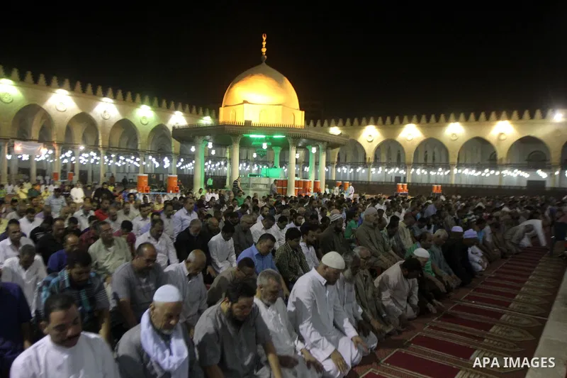 Egyptian worshipers perform take part in an evening prayer "Taraweeh", at Amr Ibn al-Aas mosque, in Cairo on June 17, 2015. Millions of Muslims around the world will mark the start of Ramadan on Thursday June 18, a month...