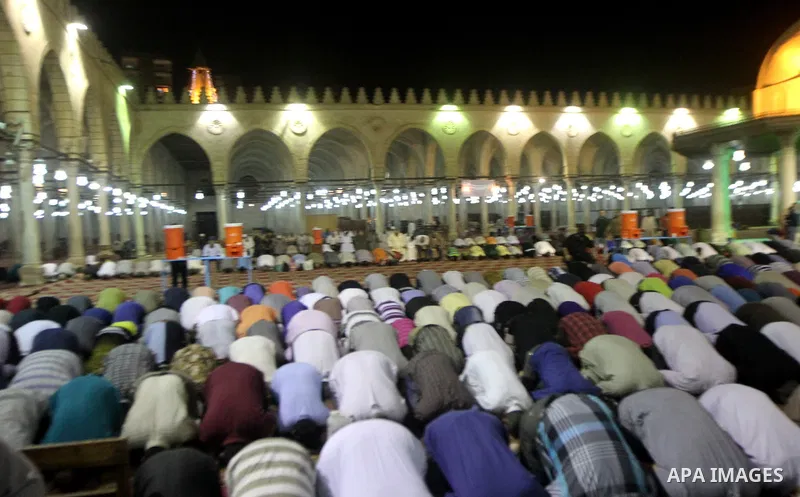 Egyptian worshipers perform take part in an evening prayer "Taraweeh", at Amr Ibn al-Aas mosque, in Cairo on June 17, 2015. Millions of Muslims around the world will mark the start of Ramadan on Thursday June 18, a month...
