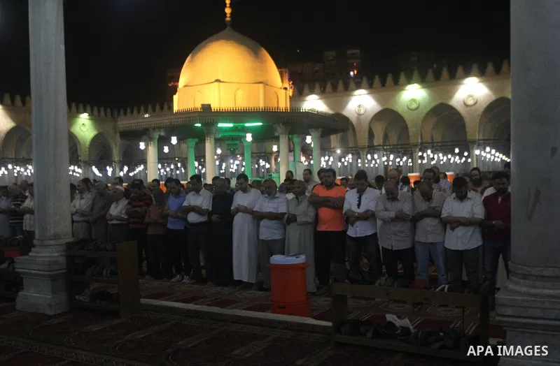Egyptian worshipers perform take part in an evening prayer "Taraweeh", at Amr Ibn al-Aas mosque, in Cairo on June 17, 2015. Millions of Muslims around the world will mark the start of Ramadan on Thursday June 18, a month...