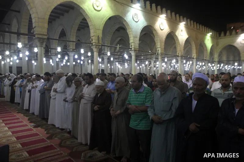 Egyptian worshipers perform take part in an evening prayer "Taraweeh", at Amr Ibn al-Aas mosque, in Cairo on June 17, 2015. Millions of Muslims around the world will mark the start of Ramadan on Thursday June 18, a month...