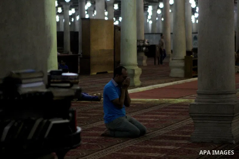 Egyptian worshipers perform take part in an evening prayer "Taraweeh", at Amr Ibn al-Aas mosque, in Cairo on June 17, 2015. Millions of Muslims around the world will mark the start of Ramadan on Thursday June 18, a month...