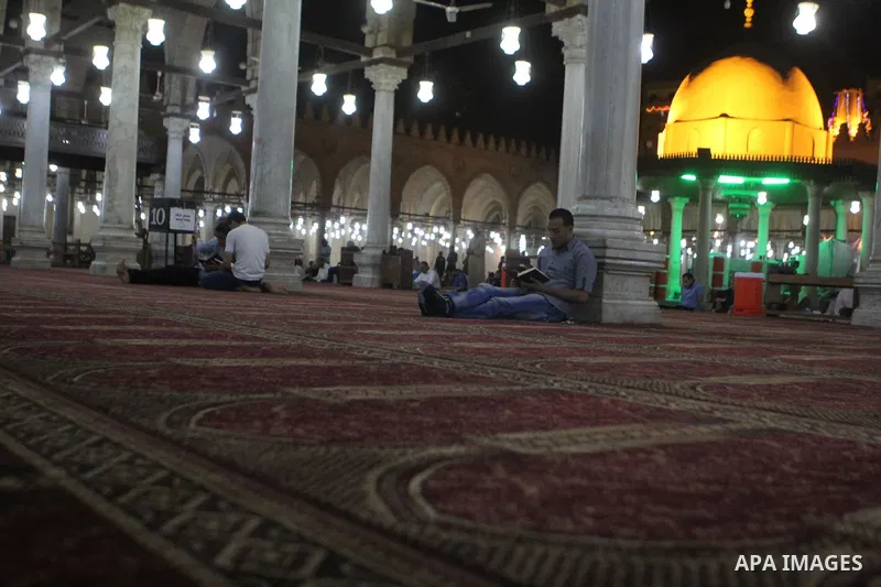 Egyptian worshipers perform take part in an evening prayer "Taraweeh", at Amr Ibn al-Aas mosque, in Cairo on June 17, 2015. Millions of Muslims around the world will mark the start of Ramadan on Thursday June 18, a month...