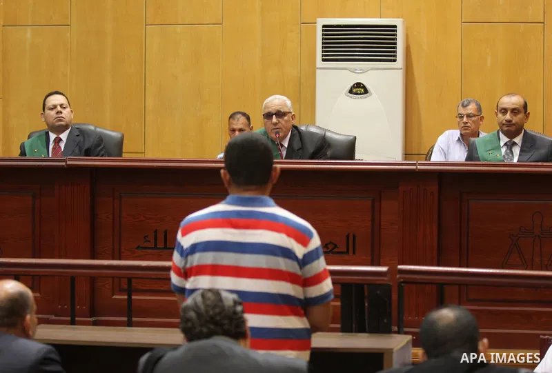 Judges attend the trial of Egyptian defendants over a 2012 stadium riot in the canal city of Port Said that left 74 people dead on June 20, 2015. Photo by Amr Sayed