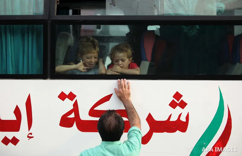 Palestinians wait for travel permits to cross into Egypt at the Rafah border crossing between Egypt and southern Gaza Strip June 23, 2015. Egyptian authorities last week decided to open the Rafah crossing to allow Palest...