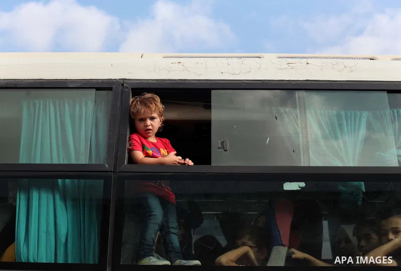 Palestinians wait for travel permits to cross into Egypt at the Rafah border crossing between Egypt and southern Gaza Strip June 23, 2015. Egyptian authorities last week decided to open the Rafah crossing to allow Palest...