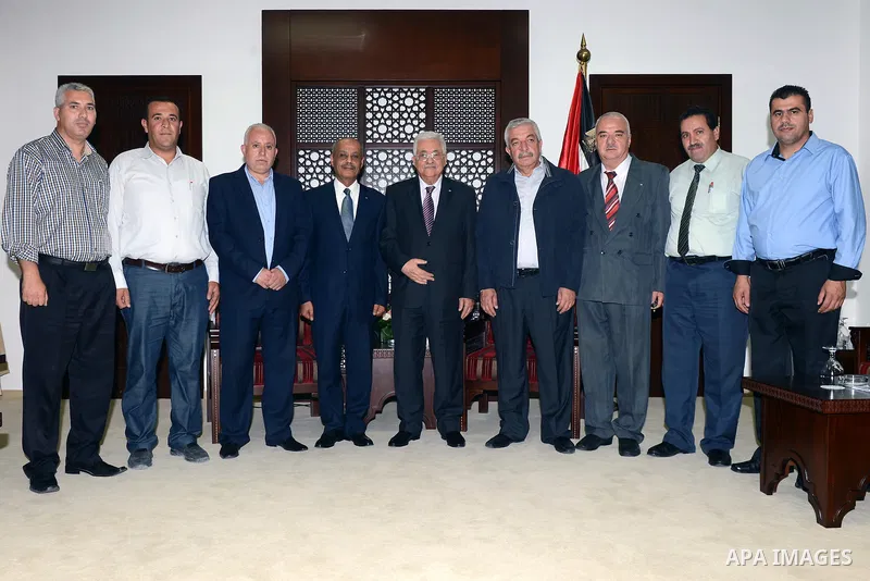 Palestinian President Mahmoud Abbas meets with a delegation of Salfit city, in the West Bank city of Ramallah, June 23, 2015. Photo by Thaer Ganaim