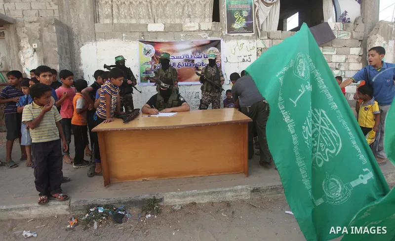 Palestinians boys wail to register their names in the summer camps organized by the Izzedine al-Qassam brigades, loyal to Hamas movement, in Dair Al Balah in the center of Gaza strip on June 25, 2015. Photo by Ashraf Amr...
