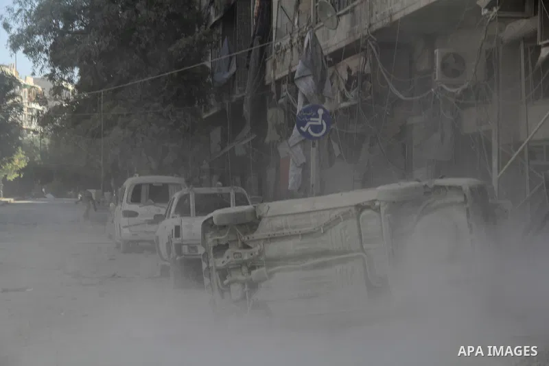 Smoke rises after a reported bomb barrel attack by Syrian government forces in Aghyar district in the northern Syrian city of Aleppo July 1, 2015. Photo by Ameer al-Halbi