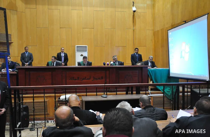 Egyptian Judges attend the trail of former Egyptian president Mohammed Morsi in a court in Cairo on July 04, 2015. Photo by Amr Sayed