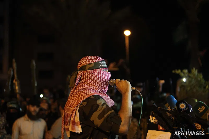 Abu Obaida spokesman of Ezz Al-Din Al Qassam militants gives a speech during a march marking the first anniversary of the 50-day Israeli war on Gaza Strip last summer, in Gaza City July 8, 2015. July 8th marks the one-ye...
