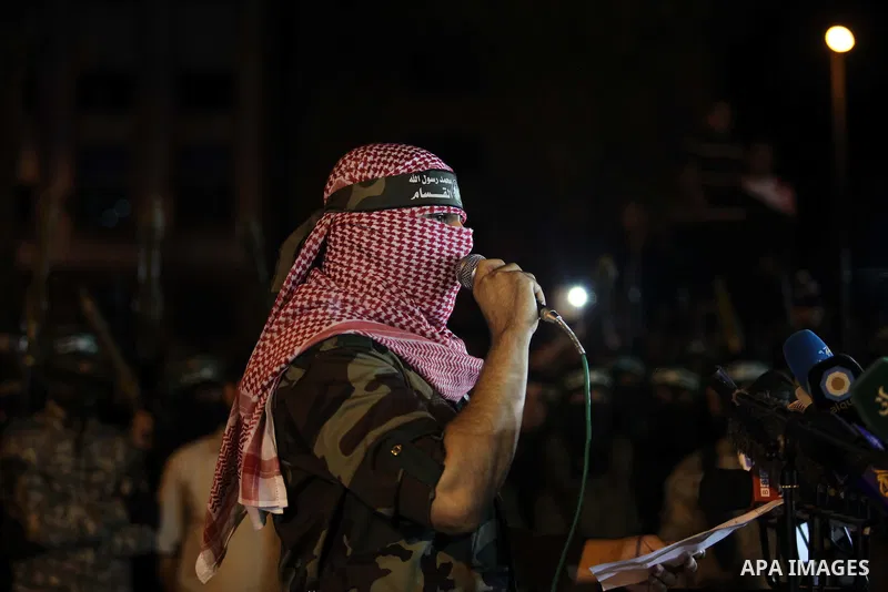 Abu Obaida spokesman of Ezz Al-Din Al Qassam militants gives a speech during a march marking the first anniversary of the 50-day Israeli war on Gaza Strip last summer, in Gaza City July 8, 2015. July 8th marks the one-ye...