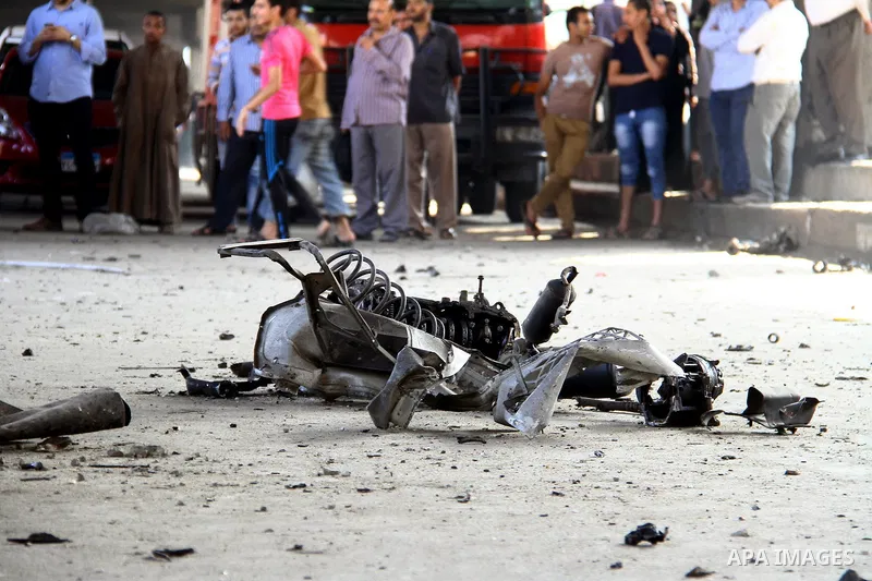 Egyptian security officials inspect the site of a bomb blast at the Italian Consulate in Cairo, Egypt, July 11, 2015. A bomb exploded in front of the Italian consulate in Cairo on Saturday, killing one person, the health...
