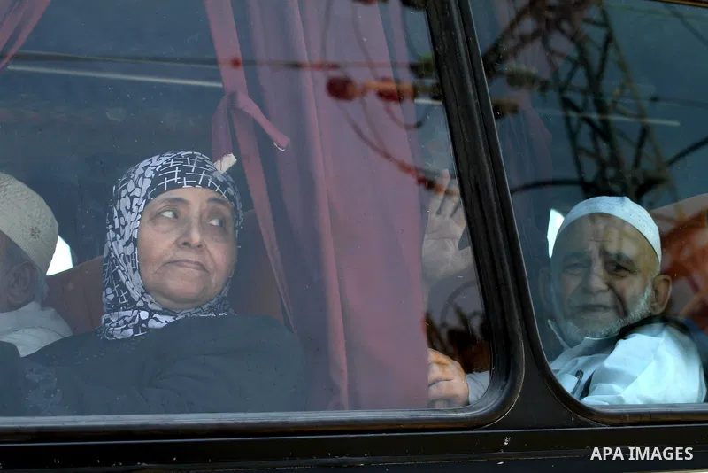 Palestinian Worshipers wait leave Gaza to enter Jerusalem to attend Laylat Al Qadr, also known as the Night of Power at Al Aqsa Mosque, through the Erez border crossing between Israel and northern Gaza Strip on July 13,...