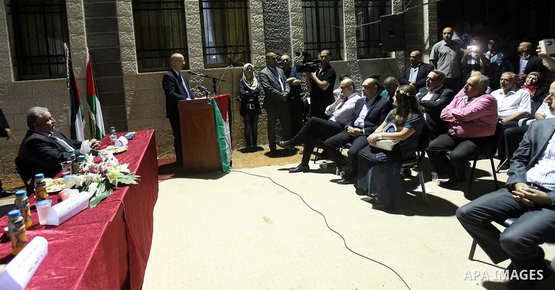 Palestinian Prime Minister Rami Hamdallah gives a speech during the opening ceremony of Tulkarem road lighting project, in the West Bank city of Tulkarem, on July 15, 2015. Photo by Prime Minister Office